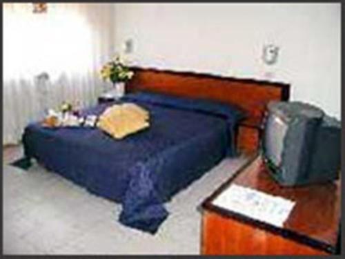Hotel Moderno Римини Номер фото